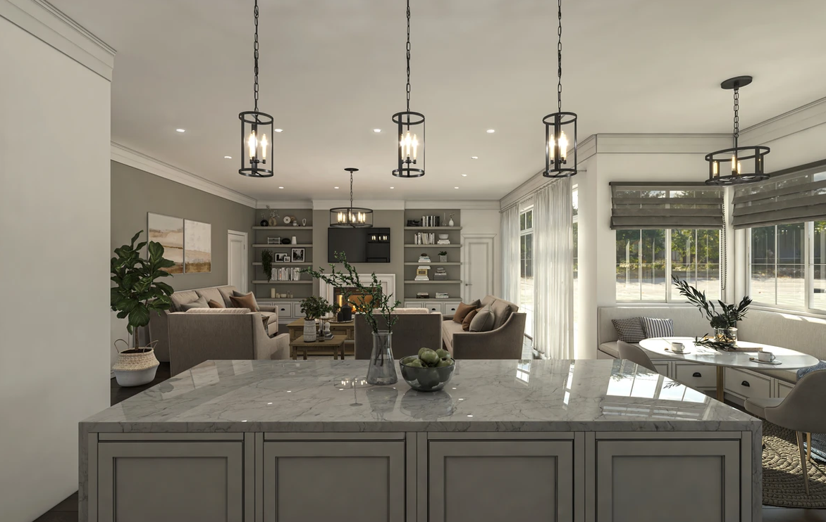 A kitchen with a marble counter top next to a living room