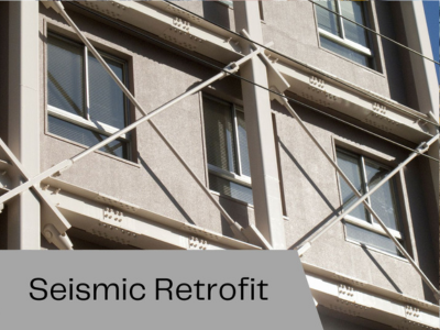 A building with a sign that says seismic retrofit